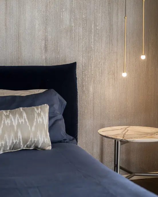 Un particolare della camera da letto del progetto di arredamento